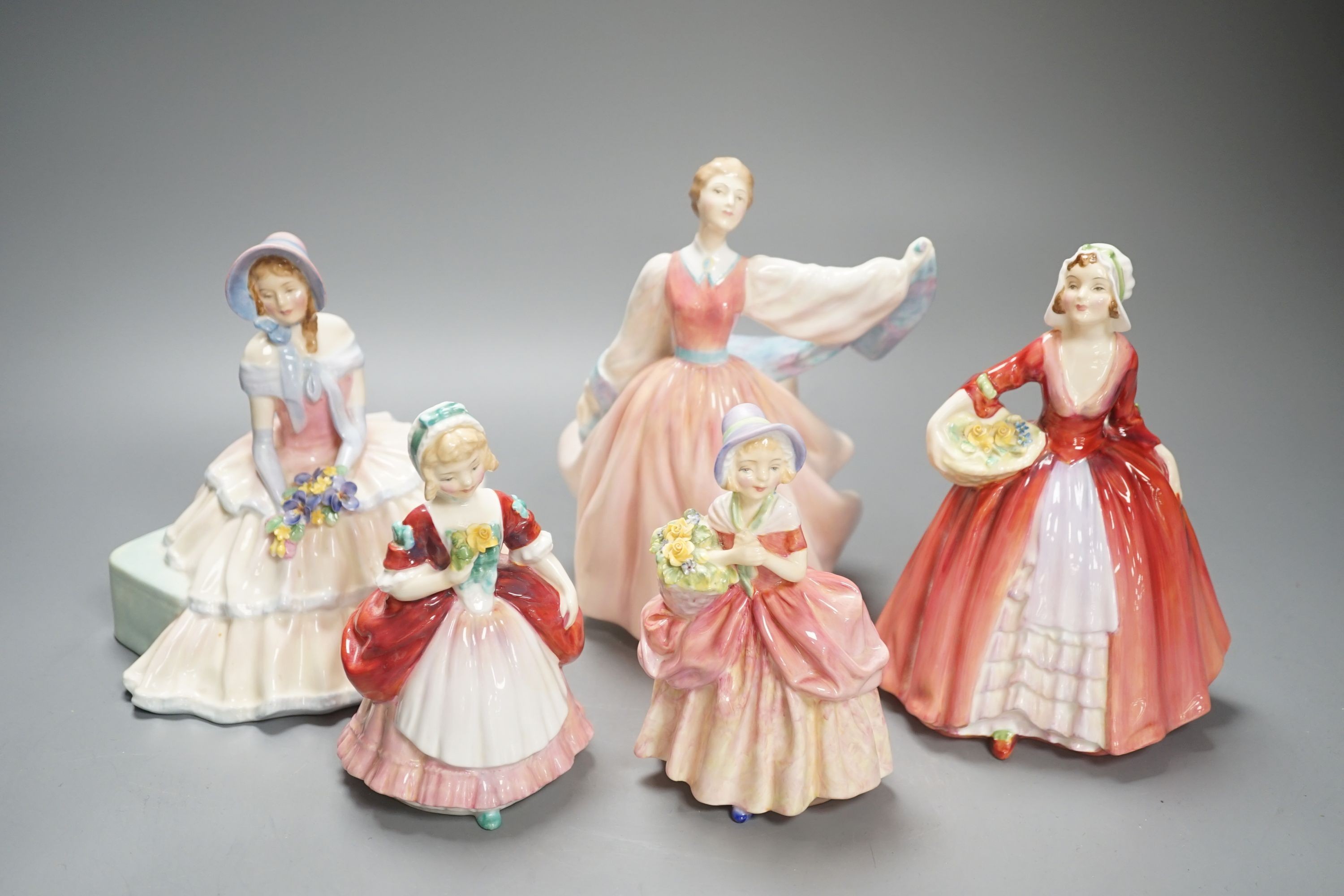 6 Royal Doulton figurines and 3 smaller figurines, Fair Lady HN2193, Gay Morning HN2135, Cissie HN1809, Valerie HN2107, Elegance HN2264, Lydia HN1908, Janet HN1537, Day Dreams HN1731 and Southern Bell HN2229